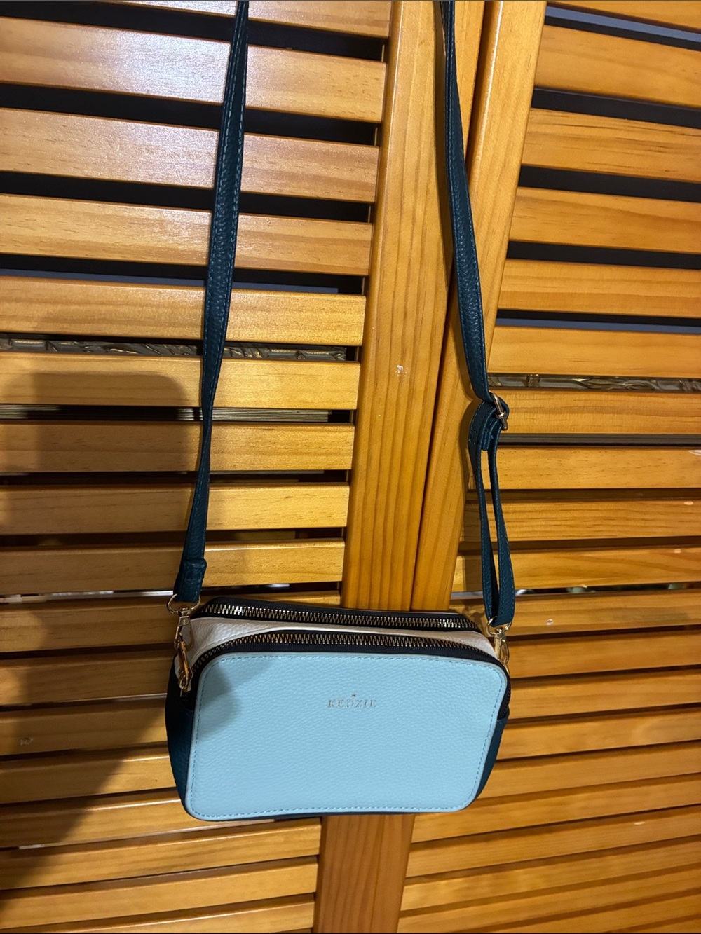 Two-Tone Light Blue and Dark Teal Crossbody Bag with Adjustable Strap